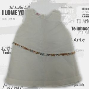 Boho style sleeveless wrap fringe dress